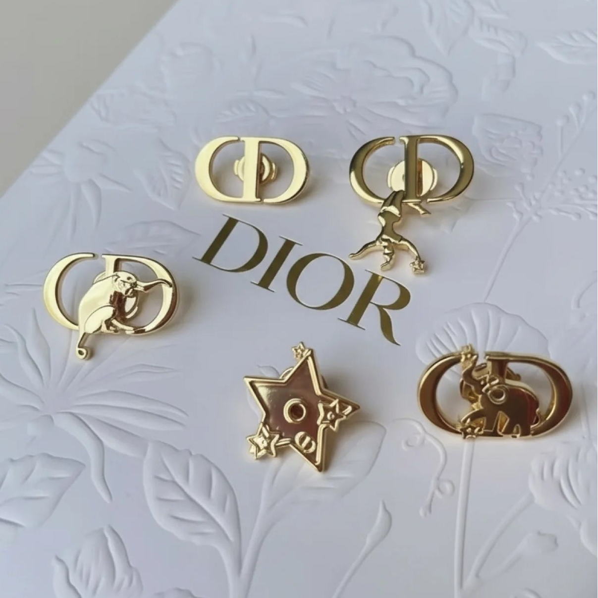 Christian Dior Holiday 2025 Gold Pin Collection (GWP)
