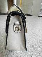 Furla — Metropolis Mini Crossbody Ivory & Black · Tiger-Print Embossed Leather · Made in Italy