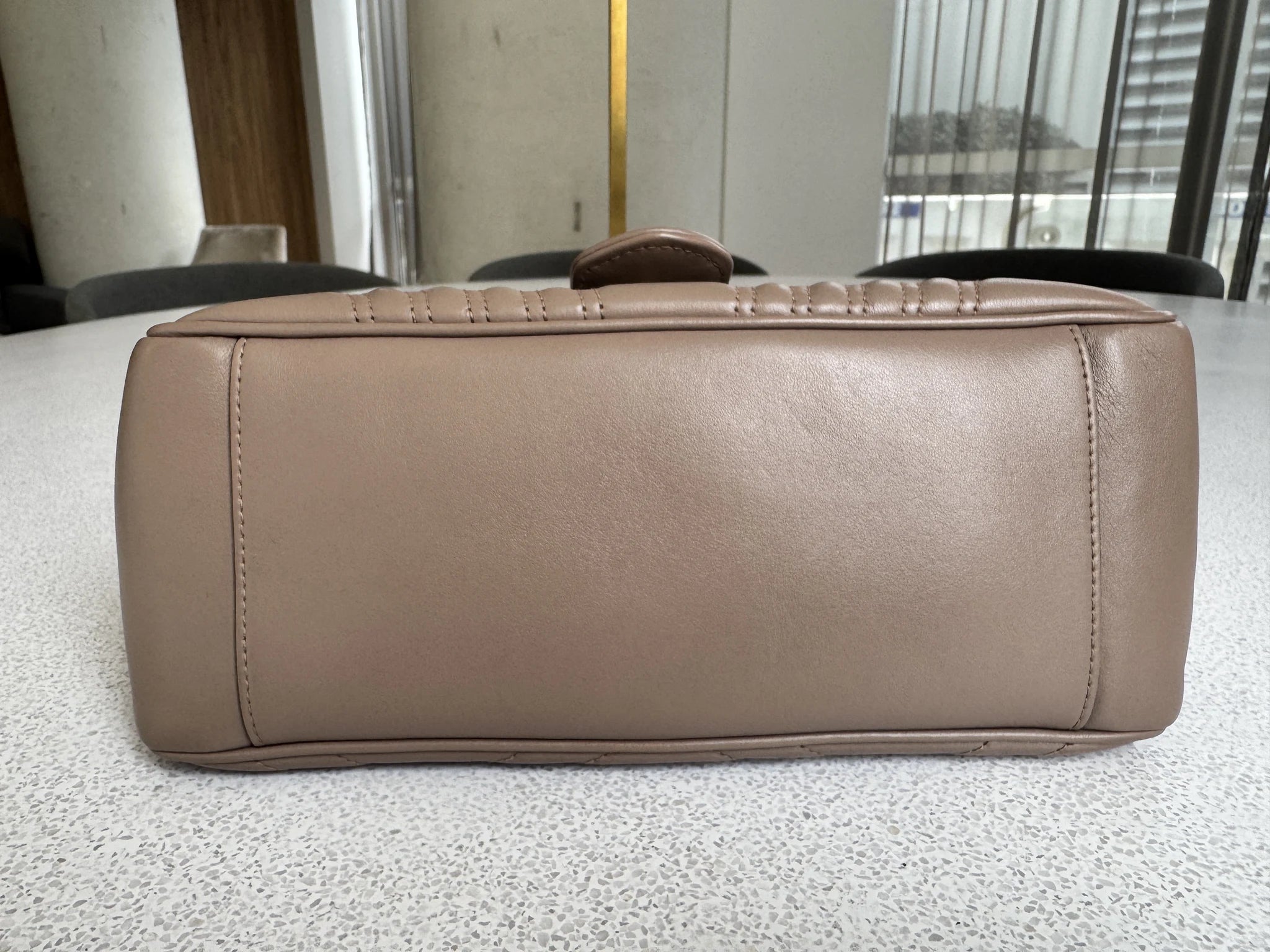 Gucci — GG Marmont Small Top Handle Bag Porcelain / Dusty Nude · Matelassé Chevron Leather · Antique Gold Hardware