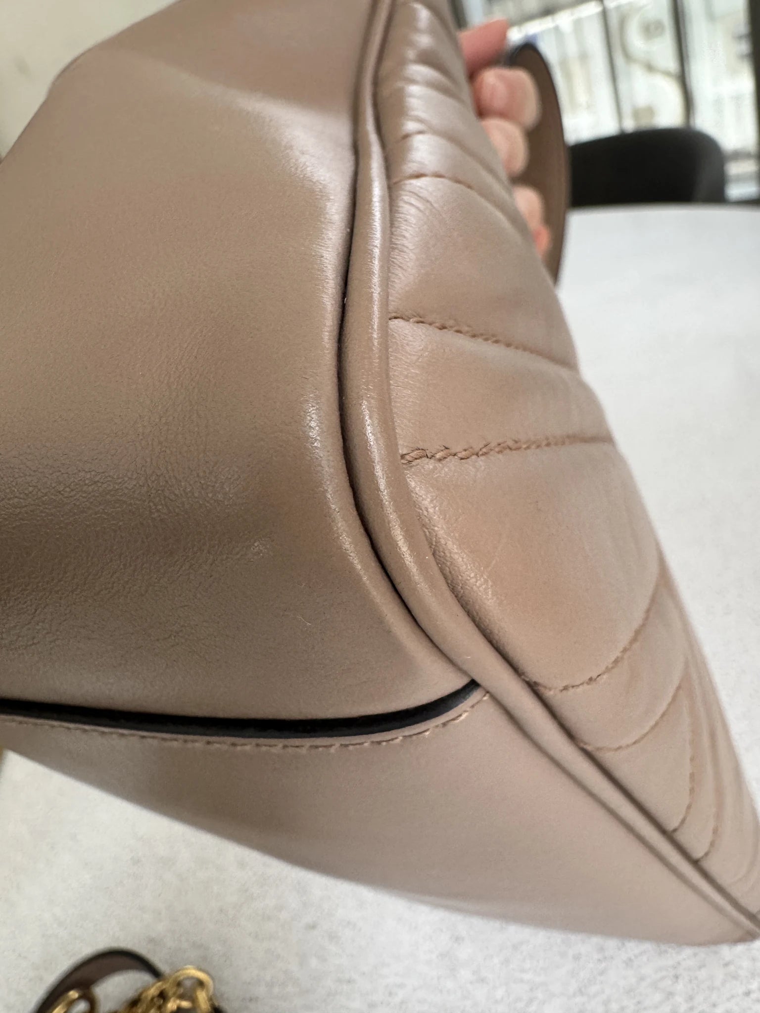 Gucci — GG Marmont Small Top Handle Bag Porcelain / Dusty Nude · Matelassé Chevron Leather · Antique Gold Hardware