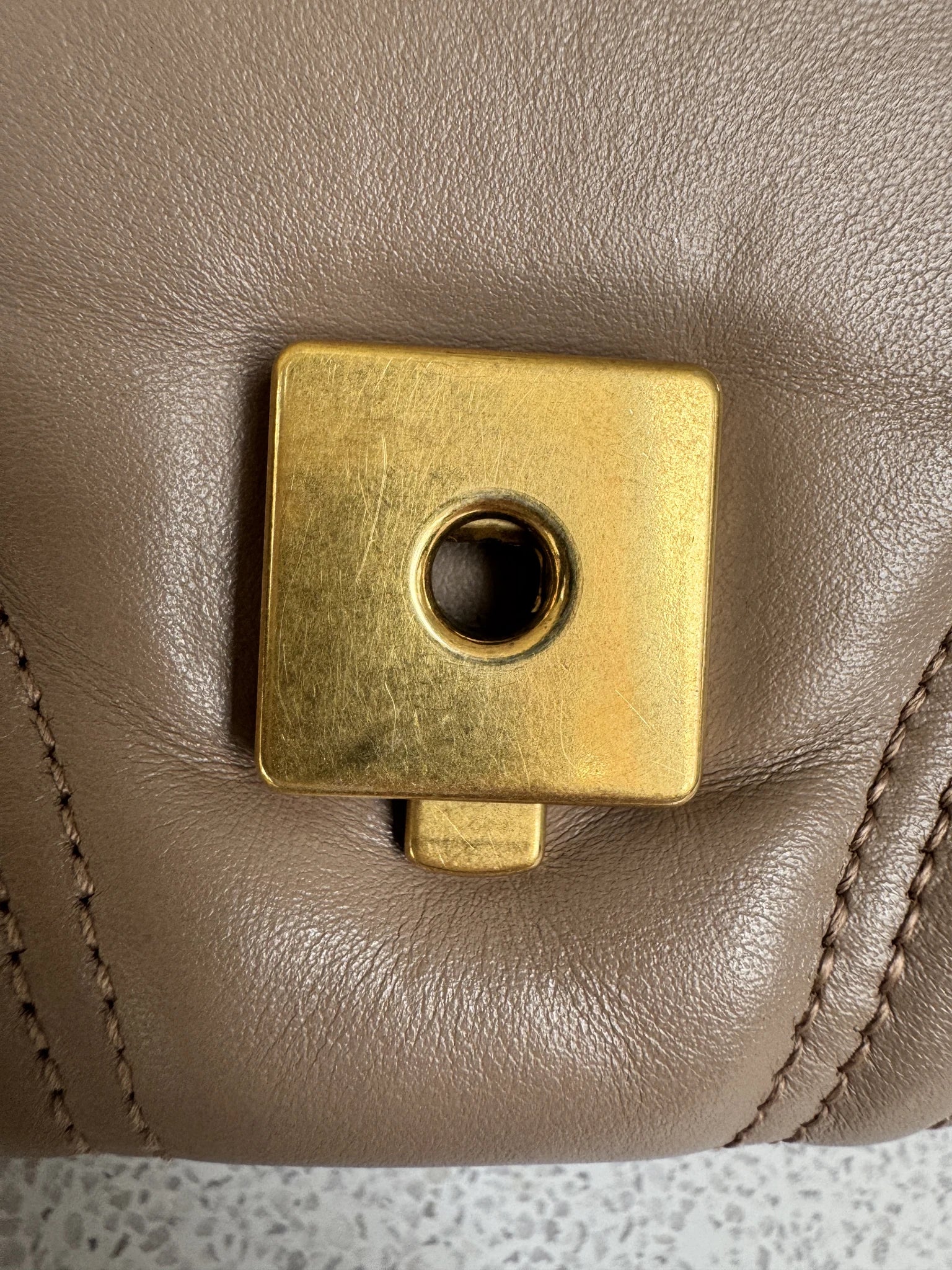 Gucci — GG Marmont Small Top Handle Bag Porcelain / Dusty Nude · Matelassé Chevron Leather · Antique Gold Hardware