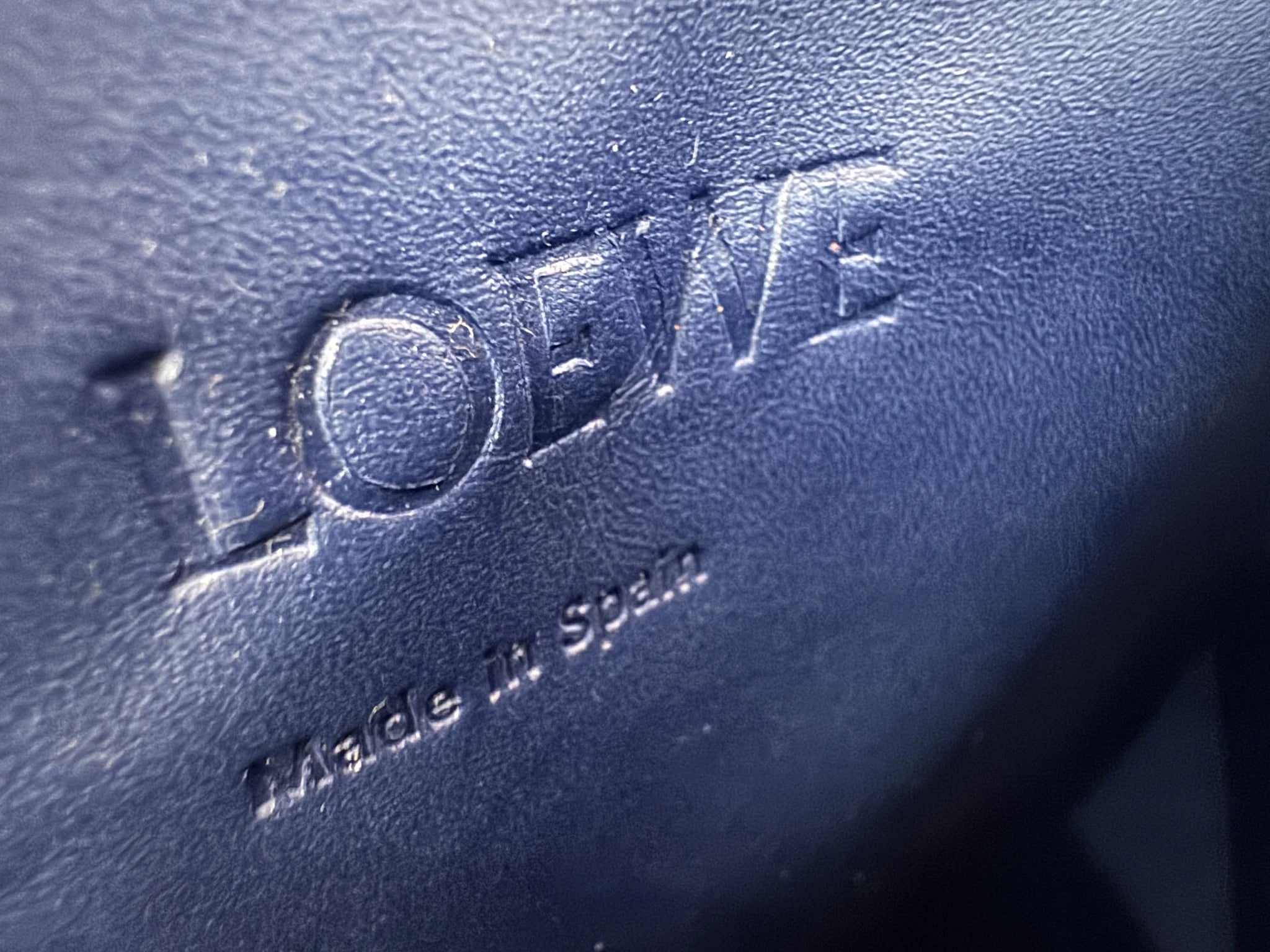 Loewe — Origami Clutch Black · Lambskin · Royal Blue Leather Interior · Made in Spain