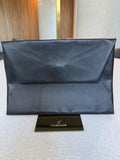 Loewe — Origami Clutch Black · Lambskin · Royal Blue Leather Interior · Made in Spain