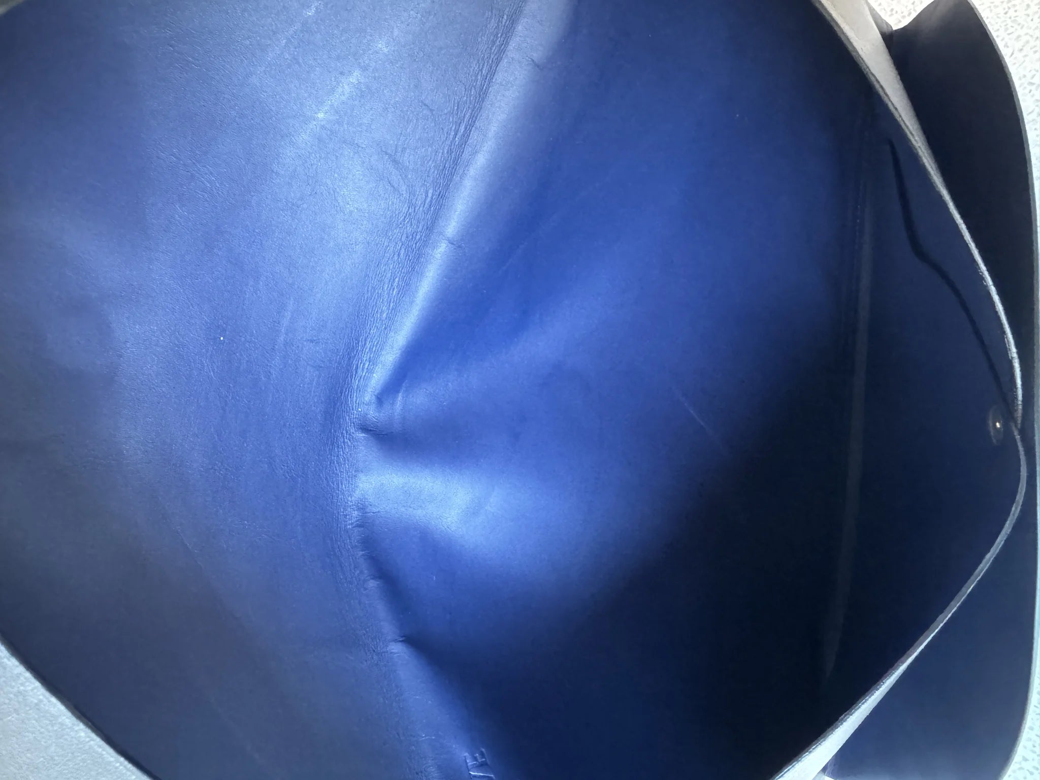 Loewe — Origami Clutch Black · Lambskin · Royal Blue Leather Interior · Made in Spain