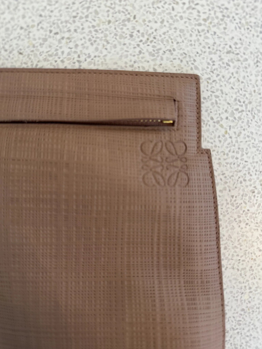 Loewe — T Pouch Taupe Repeat Anagram Leather · Made in Spain