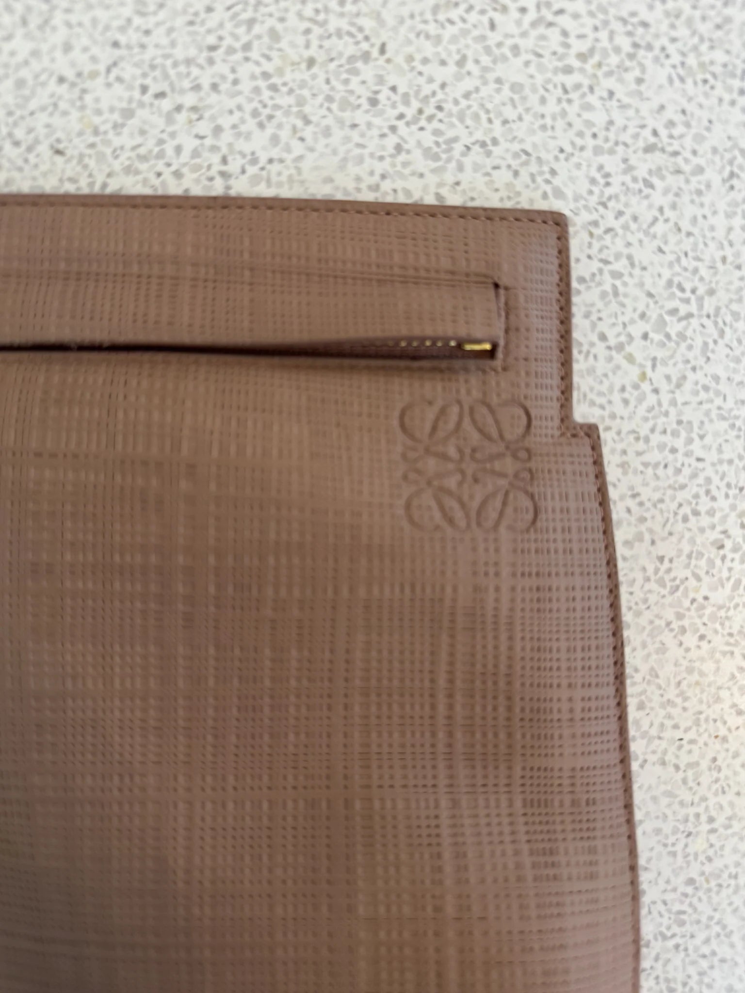 Loewe — T Pouch Taupe Repeat Anagram Leather · Made in Spain