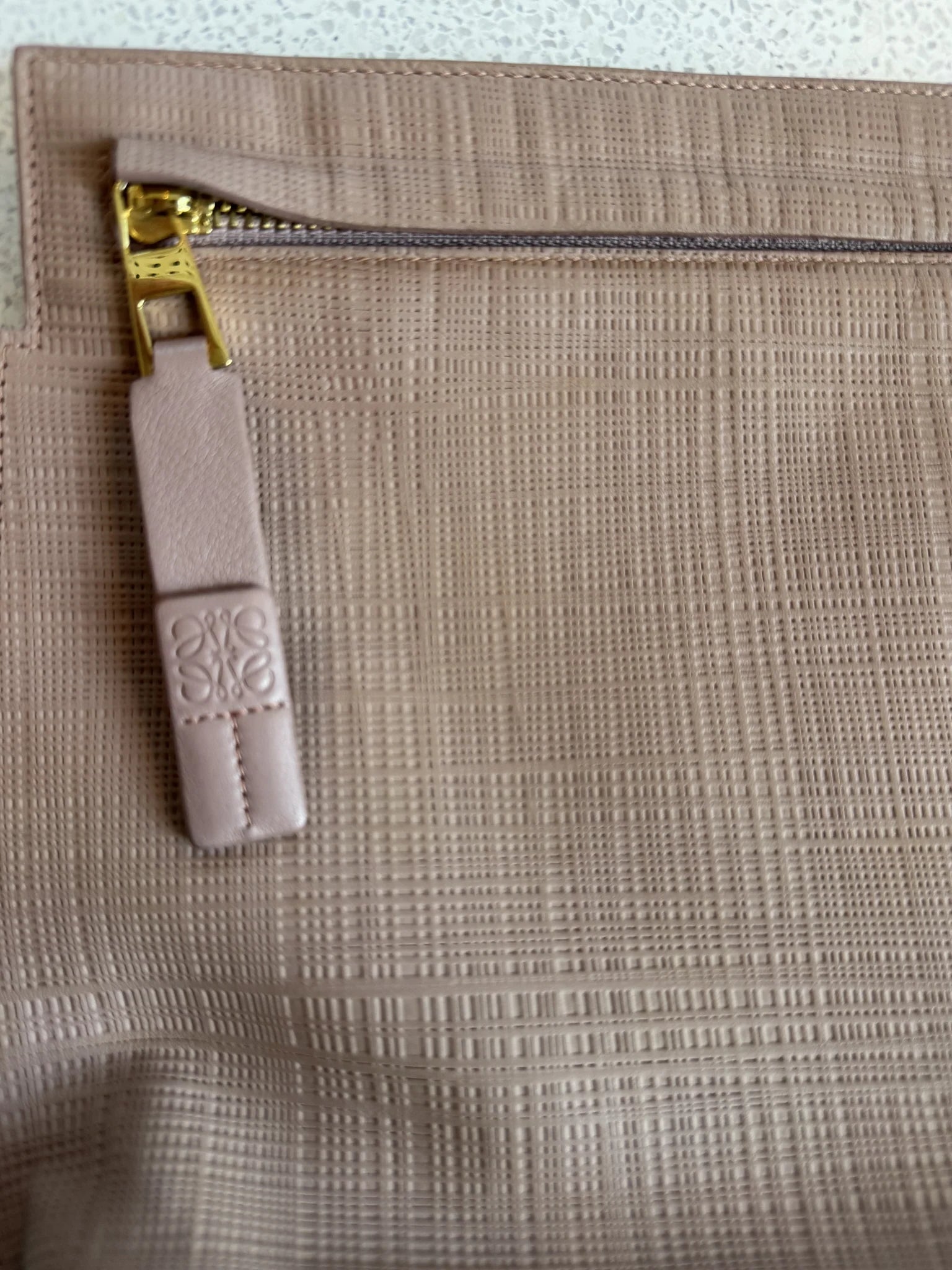 Loewe — T Pouch Taupe Repeat Anagram Leather · Made in Spain