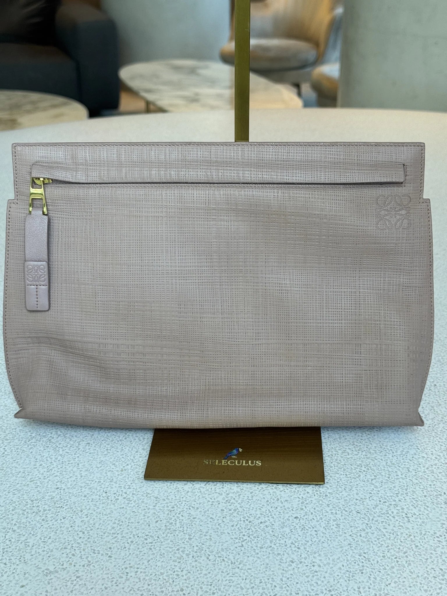 Loewe — T Pouch Taupe Repeat Anagram Leather · Made in Spain