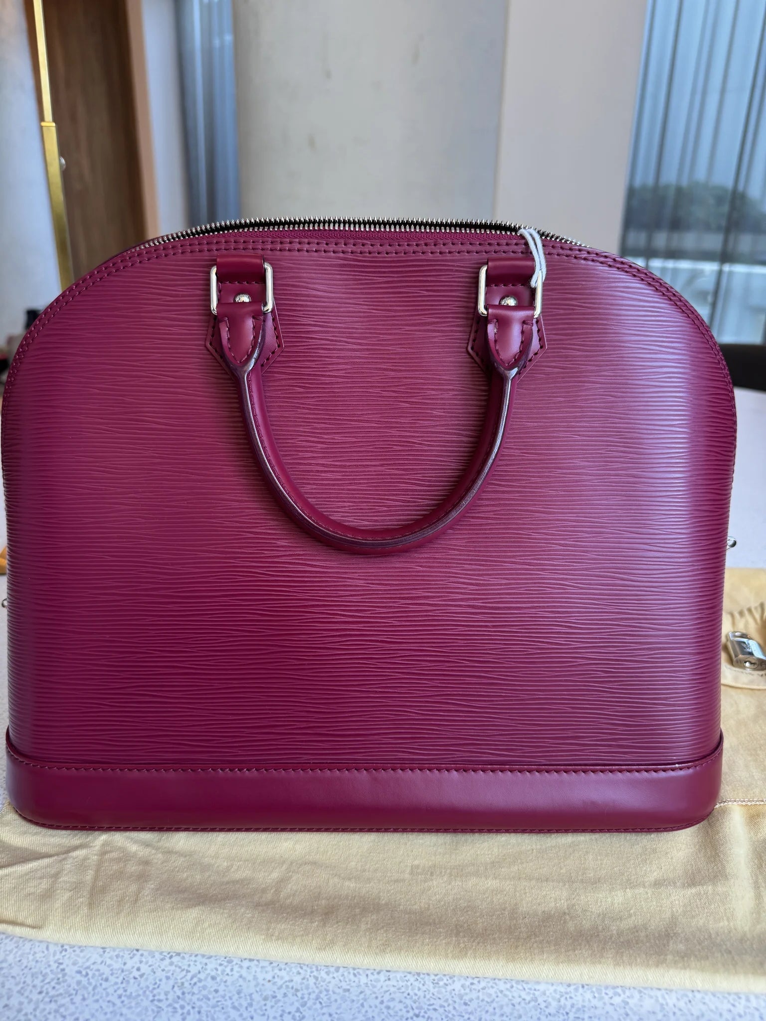 Louis Vuitton — Alma GM Fuchsia · Epi Leather · Made in France