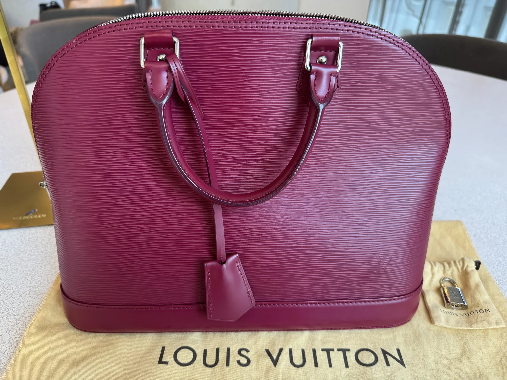 Louis Vuitton — Alma GM Fuchsia · Epi Leather · Made in France