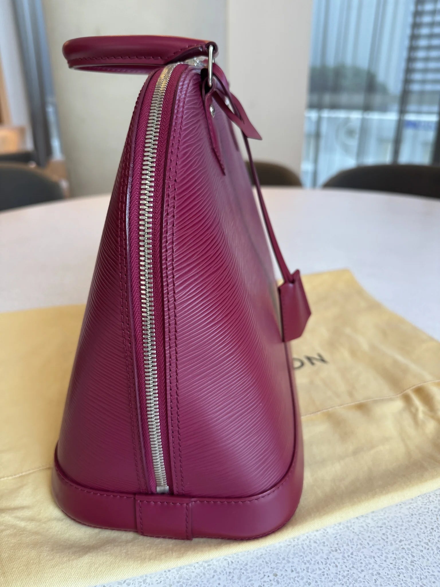 Louis Vuitton — Alma GM Fuchsia · Epi Leather · Made in France