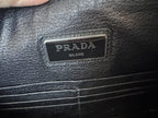 Prada — Large Saffiano Pouch Rubino · Saffiano Leather · Silver Hardware · Made in Italy