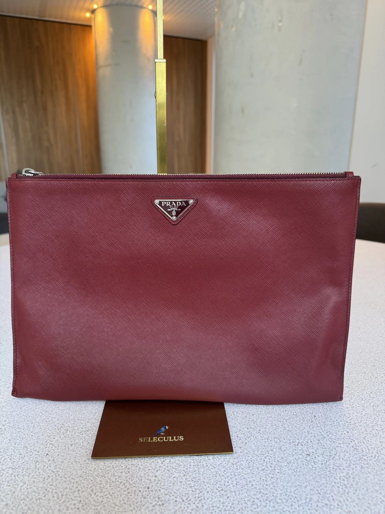 Prada — Large Saffiano Pouch Rubino · Saffiano Leather · Silver Hardware · Made in Italy