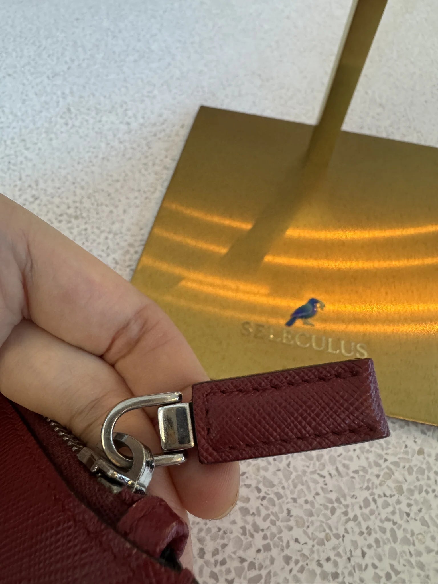 Prada — Large Saffiano Pouch Rubino · Saffiano Leather · Silver Hardware · Made in Italy